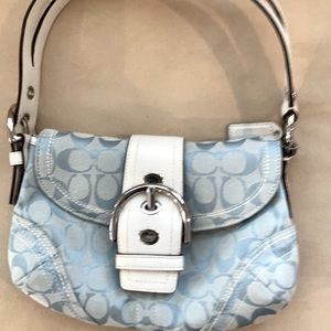 Pale blue Coach small shoulder bag.